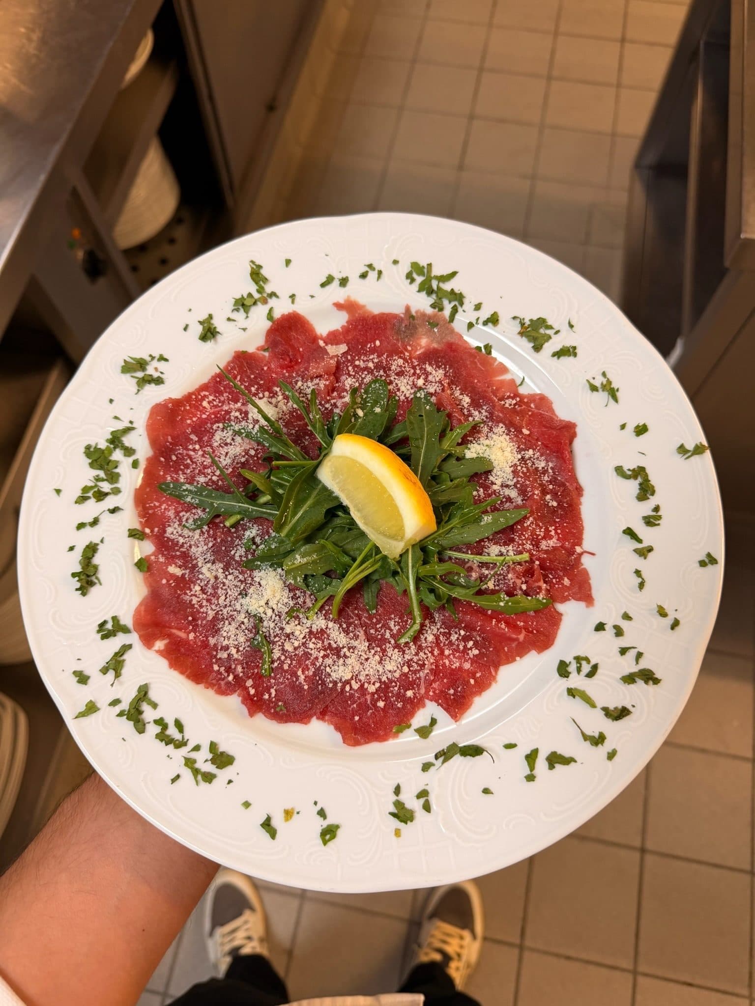 Carpaccio with rocket, Parmesan and lemon
